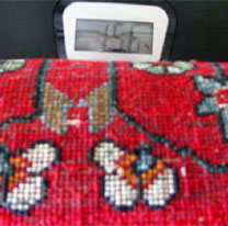 15.6# of weight when rug was brought into our shop for washing